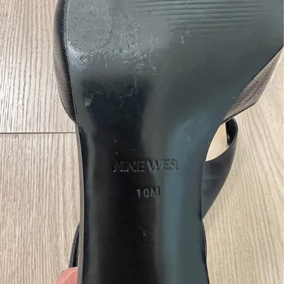 This is a pair of black pointed-toe stiletto heels. - Picture 3 of 3